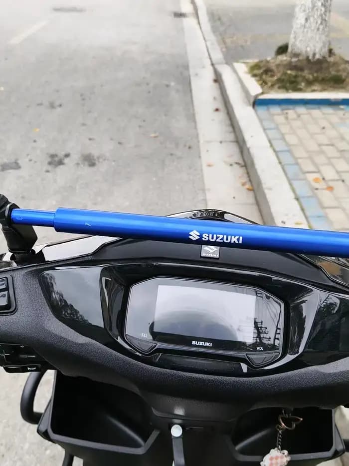 Barre d'extension réglable universelle pour guidon