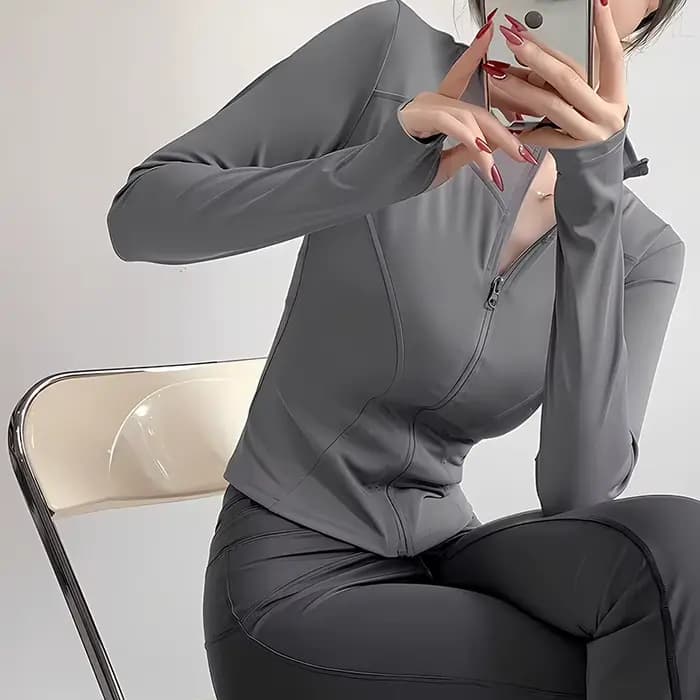 Veste de sport ajustée pour femme, séchage rapide, manches longues, taille cintrée, idéale pour le yoga, la course et le fitness en extérieur – Collection Printemps-Automne