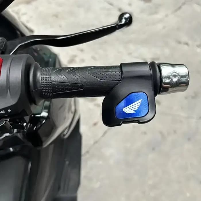 Pince d'accélérateur pour guidon de moto