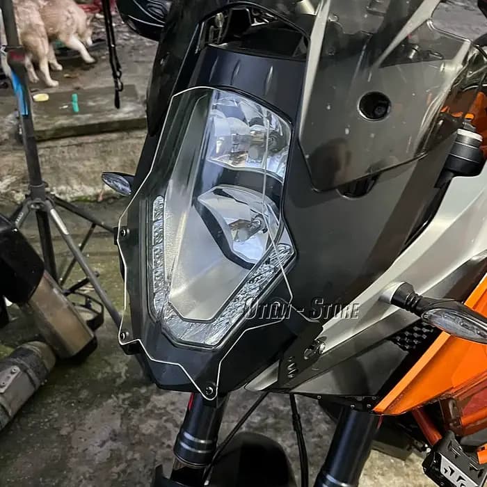 Couvercle de protection des phares de moto
