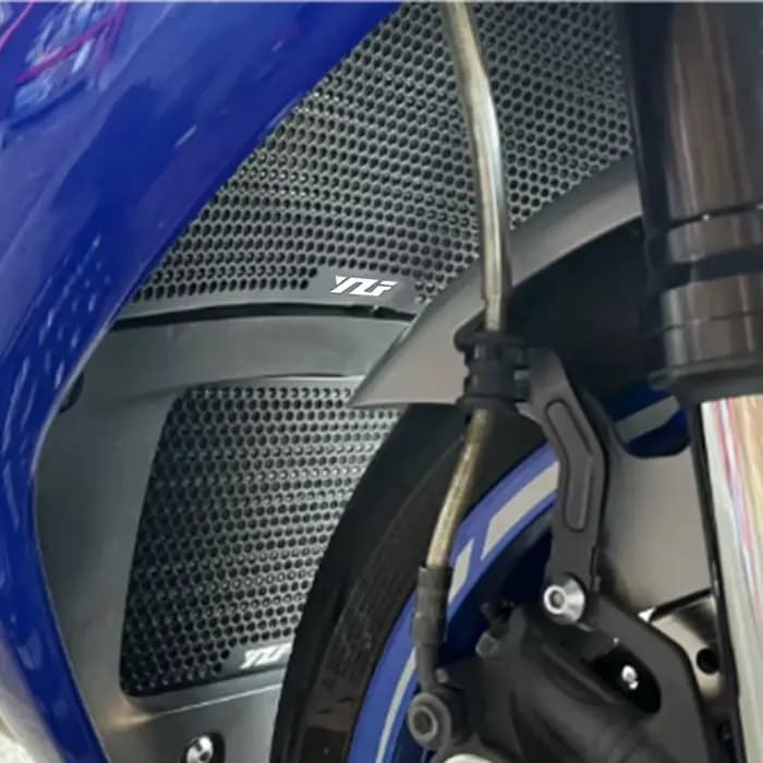 Couvercle de protection de calandre de moto